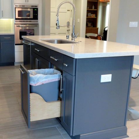 This fabulous kitchen island is a workhorse -- it features a dishwasher, sink with gooseneck faucet, sliding trash can and -- of course -- counter prep space. Adding a multitasking piece of furniture is a great way to get more out of a smaller kitchen. Small Kitchen Ideas Remodel Layout, Kitchen Island With Sink And Dishwasher, Sink And Dishwasher, Island With Sink, Island Sink, Kitchen Layouts With Island, Kitchen Island With Sink, Sink In Island, Small Kitchen Island