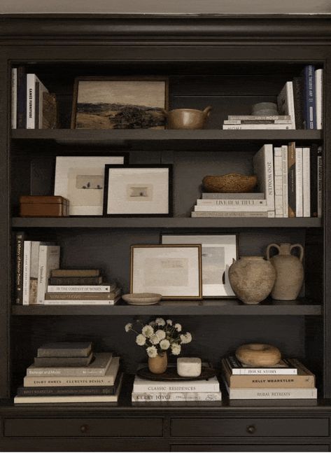 Living Room Cozy Minimalist, Bookshelf Styling With Photos, Brown Shelves Living Room, Shelf Styling With Family Photos, Dark Wood Bookcase Styling, Book Shelves Styling, Styled Shelves Living Room, Moody Shelf Decor, Dark Academia Shelf Decor