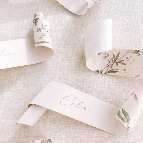 Aileen | Plume Calligraphy on Instagram: "Scrolled place cards with a little something extra! 🌺" Scroll Place Cards, Elegant Place Cards, Wedding Graphics, Copperplate Calligraphy, Hand Lettering Inspiration, Calligraphy Name, Name Place Cards, Custom Gift Tags, Wedding Name