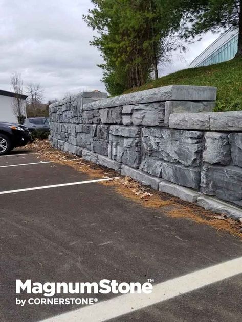 This gorgeous Magnumstone retaining wall with cap units provides business owners with a professionally landscaped look for their parking lot. Large Retaining Wall Blocks, Large Retaining Wall, Interlocking Concrete Blocks, Block Retaining Wall, Jersey Barrier, Retaining Wall Blocks, Diy Backyard Landscaping, Retaining Walls, Backyard Projects