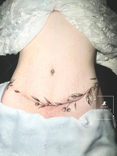 Tattoo For Belly For Women, Tummytuck Tattoo Coverup Women, Wrap Around Stomach Tattoo, Belly Scars Cover Up Tattoo, Tattoo Lower Belly, Breast Lift Tattoo Cover Up, Stomach Scar Tattoo Cover Up, Tattoo Ideas Lower Back, Cute Belly Tattoos