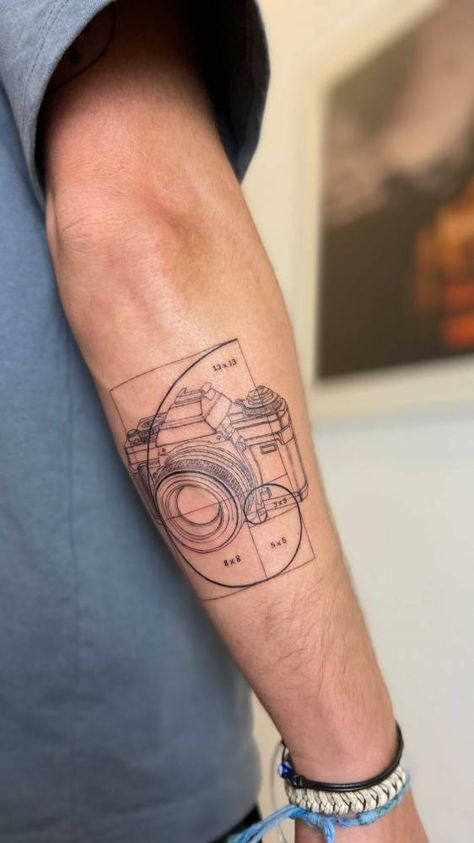 Camera Related Tattoos, Tattoo For Photographer Ideas, Camera Geometric Tattoo, Camera Tattoo Design For Men, Tattoo Camera Photography, Camera Tattoos For Men, Tattoo Ideas For Photographers, Film Photography Tattoo, Photography Tattoo Ideas Men