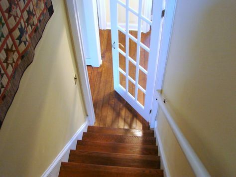 I love this door at the bottom of the stairs...it is EXACTLY what I want leading into the basement. Open Basement Stairs, Apartment Stairs, Bottom Of Stairs, Basement Steps, Basement Doors, Dream Basement, Building A Door, Diy Staircase, House Staircase