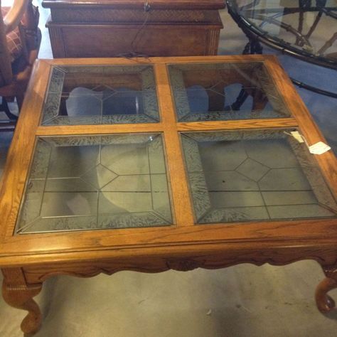 Found an outdated coffee table at the used furniture store for $65 bucks.  It was solid oak and had interesting glass cutouts.  I immediately knew what I wanted… Glass Top Coffee Table Makeover Diy, Glass Coffee Table Makeover, Coffee Table Restoration, Refurbished Coffee Tables, Coffee Table Upcycle, Coffee Table Redo, Table Redo, Coffee Table Makeover, Old Coffee Tables