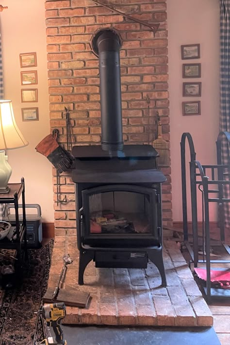 Subway Tile Behind Wood Burning Stove, Farmhouse Wood Stove Fireplace, Wood Stove Between Windows, Wood Stove With Mantle, Wood Stove Corner, Wood Stove Decor, Corner Wood Stove, Savage Daughter, Wood Stove Surround