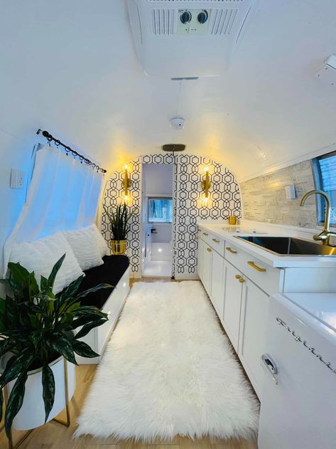 22ft Camper Remodel, Airstream Remodel Bathroom, Remodeled Airstream Interiors, Airstream Lighting, Converted Airstream, Backyard Airstream, Airstream Interior Ideas, Luxury Airstream, Airstream Safari