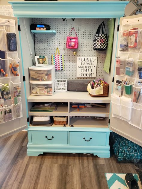 Repurposed armoire to craft cabinet for $134! $100 for cabinet, sanded, primed, painted and added peg board and hooks for $16, two shoe organizers for $8 and under cabinet lighting for $10!! Stores all Cricut, paint, scrapbook and crafting supplies! Armoire Craft Cabinet Diy Cricut, Armoire Into Craft Cabinet, Cricut Craft Cabinet, Diy Craft Storage Cabinet Organizing Ideas, Armoire Repurpose Craft Storage, Armoire Makeover Craft Storage, Armoire To Craft Cabinet, Cricut Cabinet Storage, Craft Armoire Diy