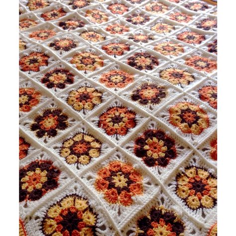 70s style decor granny square blanket made from 6 petal crochet african flowers pattern Chrocet Blankets, Vintage Granny Square Blanket, Fall Granny Square Blanket, Crochet Blanket Halloween, Granny Square 70s, 70s Crochet Home Decor, Crochet Fall Blanket, 70s Crochet Patterns, 70s Quilt