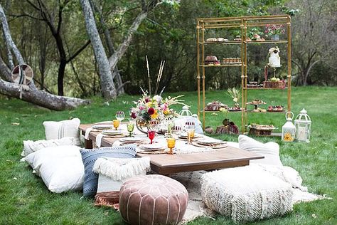 Ask The Experts: How To Bring a Bohemian Vibe Into Your Wedding Catering Picnic Set Up Ideas, Dining Table Arrangements, Luxe Picnic, Boho Dining Table, Cocktail Bar Set, Set Up Ideas, Crystal Champagne Flutes, Macrame Backdrop, Boho Picnic