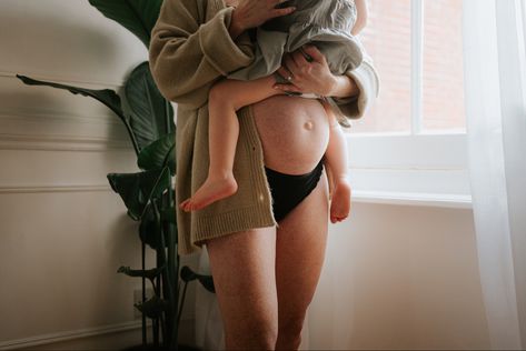 Pregnant mother holding toddler over bump Cozy Indoor Maternity Photos, Inhome Maternity Session, In Home Maternity Session With Toddler, Indoor Maternity Photos With Toddler, Pregnant With Toddler, At Home Maternity Shoot With Toddler, Pregnancy Photoshoot Ideas At Home, Pregnancy Photos With Toddler, Bedroom Maternity Shoot