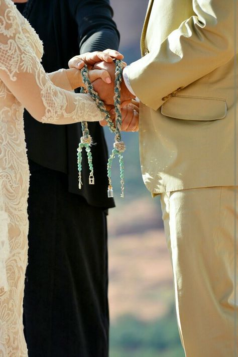 Our hand fastening ceremony, the rope made by yours truly. I'm so proud of how it turned out. After the wedding ceremony we filled the little jar on the end with some of the red dirt from the mountain top. Hand Tie Wedding Ceremony, Wedding Hand Tying Ceremony, Wedding Rope Braid Ceremony, Knot Tying Ceremony Wedding, Hand Tying Ceremony, Hand Fastening Ceremony, Mountaintop Wedding, Norwegian Wedding, Wedding Knot