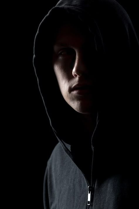 Portrait of mysterious man in the dark Free Photo Man In Hoodie, Low Key Portraits, Mysterious Man, Dark Portrait, Studio Portrait Photography, Portrait Photography Men, Dark Images, Self Portrait Photography, Man Photography