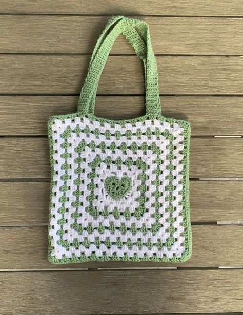 Extremely gorgeous and stunning crochet hand knitted hand made tote bag shoulder bag designs small crochet bag aesthetic #small rochetbagaesthetic #crochet #crochetbag #crochetbags 2.1080 Crochet Cute Granny Square, Granny Square Shopping Bag, Crochet Projects With Granny Squares, Granny Square Heart Pattern, Heart Granny Square Bag, Plain Granny Square, Heart Crochet Bag, Crochet Granny Square Bag, Granny Square Tote Bag