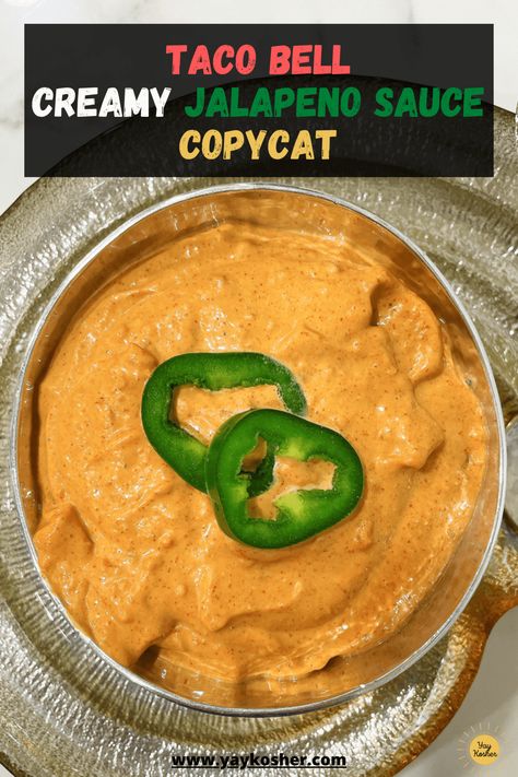 This kosher copycat recipe for Taco Bell Creamy Jalapeno Sauce is a dream come true. It is creamy, satisfying and mildly spicy. Make this recipe right at home and don't miss out on a thing. Our recipe for Taco Bell Creamy Jalapeño Sauce (Copycat) is kosher, gluten free, and dairy. Taco Bell Jalapeno Cream Sauce, Taco Bell Creamy Jalapeno Sauce Recipe, Taco Bell Creamy Jalapeno Sauce, Creamy Jalapeno Sauce, Savory Butternut Squash, Taco Bell Recipes, Kosher Diet, Dairy Recipes, Creamy Jalapeno