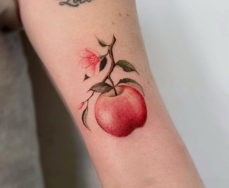 Posted by Tori Jones: Welcome to the colorful world of Apple Tattoos! Ever wondered why so many people are inking these crisp, juicy fruits on their skin? You're about to f... Apple Tattoo Ideas, Apple Tattoos, Bad Apple Tattoo, Apple Blossom Tattoos, Apple Tree Blossoms, Apple Tattoo, Tattoos 2024, 50 Tattoo, Fruit Tattoo