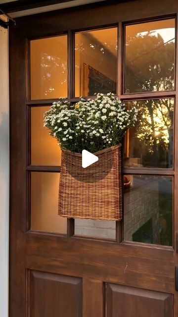 McKenna Barry on Instagram: "Our front porch just got 10x more whimsical 🍄  I’ve never been a big fan of wreaths other than for Christmas, but I always felt like our front door was missing something that served the same purpose year-round. Then one night, I was scrolling aimlessly on @pinterest, as one does, and I saw a door basket!! I FELL IN LOVE and ordered this immediately! SUCH a cute way to have a seasonally festive door that is also aesthetically pleasing & unique!   #doorwreath #frontdoordecor #porch #porchdecor #homedecor #interiordesign #cottagecore #cottagecoreaesthetic #fyp #foryou #foryoupage #cozy #cozyathome #wreathalternative #reels #reelsinstagram #reelsvideo #whimsical #homedecoration #homedesign #doorbasket" Round Basket Decor, Mckenna Barry, Front Door Basket, Brighton Townhouse, Front Door Baskets, Cozy Porch, Wreath Alternative, Door Basket, Small Cottage Homes