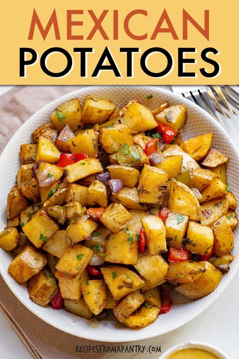 Mouthwatering Mexican Potatoes made with onions, peppers, and cilantro are a tasty twist on traditional potato side dishes. Roasted to perfection, they offer a zesty and satisfying addition to any meal. These baked Mexican potatoes are quick and easy to make for weeknight dinners, parties, and bringing to potlucks. Customize with your favorite toppings and enjoy the burst of Mexican flavors in every bite. Click through to get this awesome Mexican potatoes recipe!! #mexicanpotatoes #mexicanfood Enchiladas Sides, Sides For Enchiladas, Sides For Fajitas, Sides For Tacos, Tacos Sides, Quick Mexican Recipes, Sides With Tacos, Mexican Potatoes, Mexican Brunch