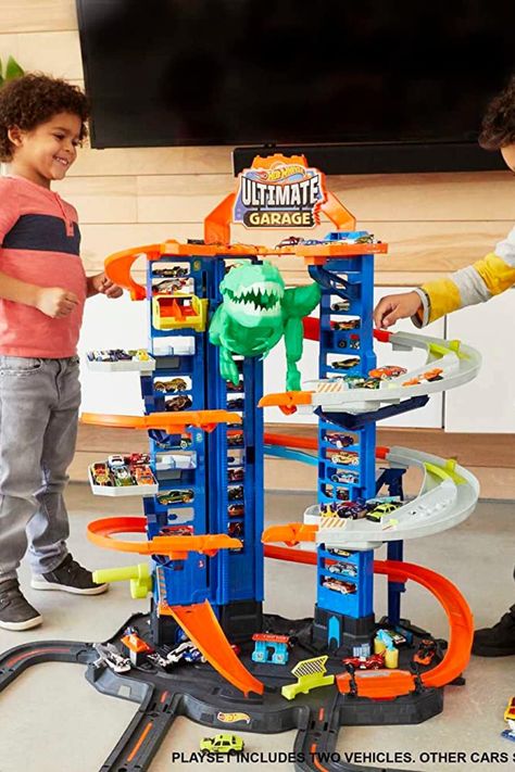 ​Inspire hours of imaginative play with an enormous Hot Wheels garage — a vertical tower with parking (easy storage) for more than 100 cars! ​Watch out for the hungry Robo T-Rex looking to devour some tasty Hot Wheels vehicles. As an Amazon Associate I earn from qualifying purchases. #hotwheels #cars #toys #game #play #fun #kids #children #CommissionsEarned Hot Wheels Ultimate Garage, Grandchildren Gifts, Hot Wheels Garage, Disney Cars Birthday, Ultimate Garage, Hot Wheels Toys, Cute Birthday Cakes, Hot Wheels Cars, Cars Birthday