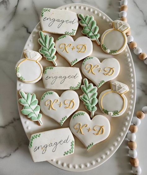 Engagement Cookies 💍❤️ • #cookie #cookies #decoratedcookies #cookiesofinstagram #cookiehack #cookietip #cookiedecorating #satisfying #satisfyingreel #cookier #newcolors #thisweekscolors #jdsugarcookies #weddingsugarcookies #engagementsugarcookies #ringcookies #greenerycookies #namecookies #initialcookies #wedding #engagement #sugarart #sugarcookie #sugarcookies #royalicing #food #cookie Custom Engagement Cookies, Engagement Sugar Cookies Decorated, Engagement Cookies Ideas, Engage Photos, Engagement Sugar Cookies, Engagement Party Cookies, Engagement Party Dinner, Engagement Cookies, Bridal Cookies