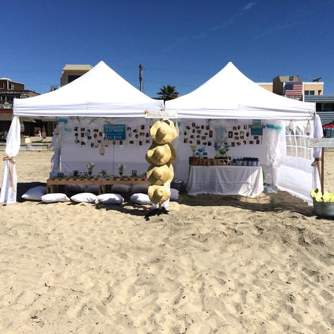 Party on the beach. 2 white pop-up tents. beach lounge on left, food table on right. hat stand and flip flip stand with signs Beach Party Setup Ideas, Beach Party Ideas At The Beach, At The Beach Birthday Party, Beach Party Set Up Ideas, Beach Event Ideas, Outdoor Beach Party, Graduation Beach Party Ideas, Beach Birthday Ideas For Adults, Beach Party Picnic