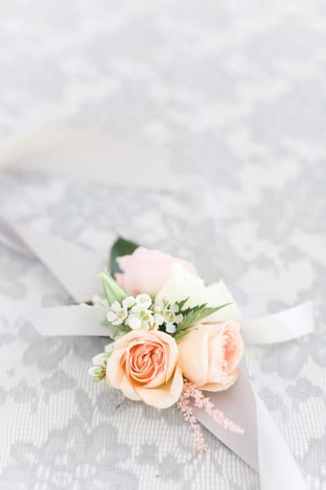 Gray and peach wrist corsage. #SoleilFlowers #Gabe+BritPhotography Pastel Corsage, Peach Corsage, Mother Of Bride Corsage, Corsage Flowers, Dance Flowers, White Corsage, Wrist Corsages, Temecula Wedding, Peach Palette