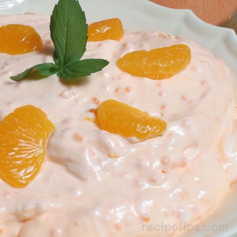 Orange Tapioca Salad 2 boxes orange jello  2 boxes tapioca pudding 3 c water (juice from fruit plus water to make 3 c) 1 20 oz drained crushed pineapple 1 11 oz drained mandarin oranges 1 8-12 oz thawed cool whip Cook pudding and liquid on med heat, to boiling point (stir frequently) add jello; cool completely! Stir in fruit, fold in cool whip. Chill 2 hrs. Tapioca Salad, Mandarin Orange Jello Salad, Orange Salad Recipes, Orange Jello Salads, Orange Fluff, Mandarin Orange Salad, Fluff Salad, Fruit Plus, Orange Jello