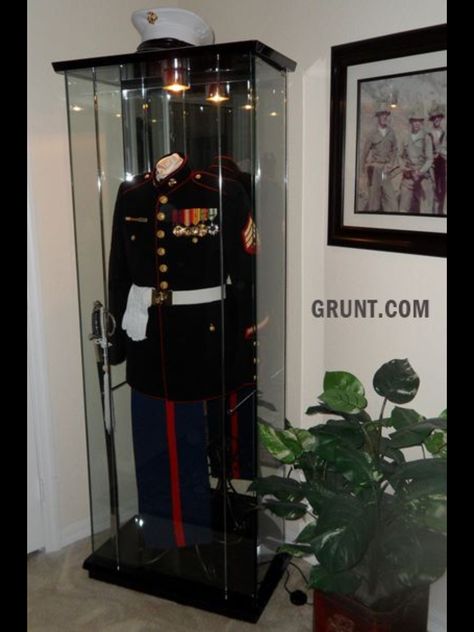 USMC man cave by Sgt. Dan Sheffer via Grunt.com.   Awesome way to display dress blues! Usmc Retirement, Uniform Display, Military Office, Military Frames, Army Retirement, Military Shadow Box, Once A Marine, Military Decor, Marine Wife