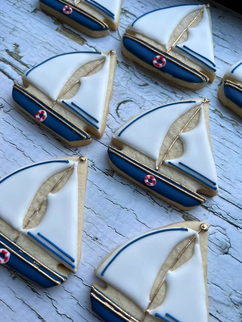 12 vanilla sugar cookies- boat only- size, colour and design may vary. Sailboat Cookies Decorated, Nautical Cookies Decorated, Coastal Cookies, Boat Cookies, Nautical Party Food, Sailboat Cookies, Nautical Cookies, Specialty Cookies, Cookies Summer