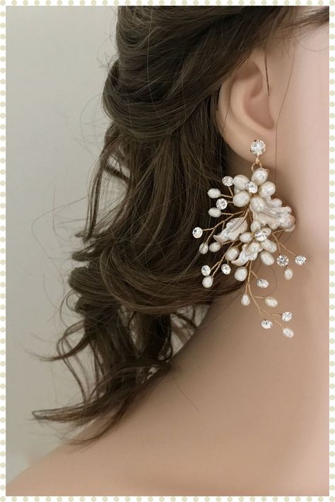 [PaidLink] 'Boho Chic Floral Statement Earrings Beautifully Detailed With Dainty Freshwater Pearls And Sparkling Crystals. These Stunning Earrings Will Add An Elegant Touch To Your Wedding Look And Are Also Lovely For Special Occasion Wear. Ready To Ship Details * Measures 1.75' Wide By 3.25' Long * Lightweight * Offered In Gold, Silver And Rose Gold * Matching Combs And Hairvines And Bracelet Bridal Jewelry: #bridalstatementearringsboho Long Wedding Earrings, Wedding Earrings Pearl, Boho Wedding Earrings, Bridal Statement Earrings, Zoo Wedding, Crystal Bridal Earrings, Pearl Earrings Wedding, Wedding Look, Flower Leaf