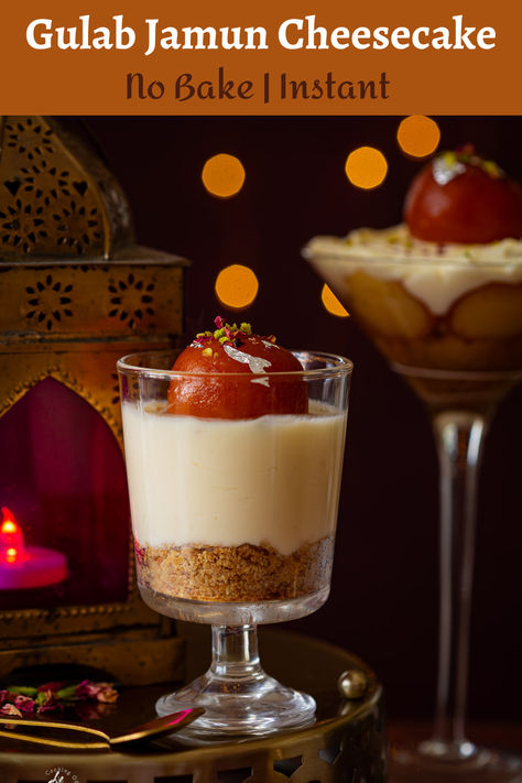 no bake gulab jamun cheesecake jar placed on a brass tray Indian Dessert Ideas, Indian Party Dessert Ideas, Indian Dessert Table Ideas, Diwali Dessert Ideas, Diwali Desserts, Indian Dessert Shooters, Gulab Jamun Cheesecake, Gulab Jamun Dessert Shots, Dessert With Gulab Jamun