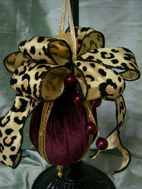 African Ornaments, Safari Christmas, Goth Xmas, Tall Vase Arrangements, Leopard Print Christmas, California Christmas, Tree Door, Leopard Christmas, Leopard Print Bow