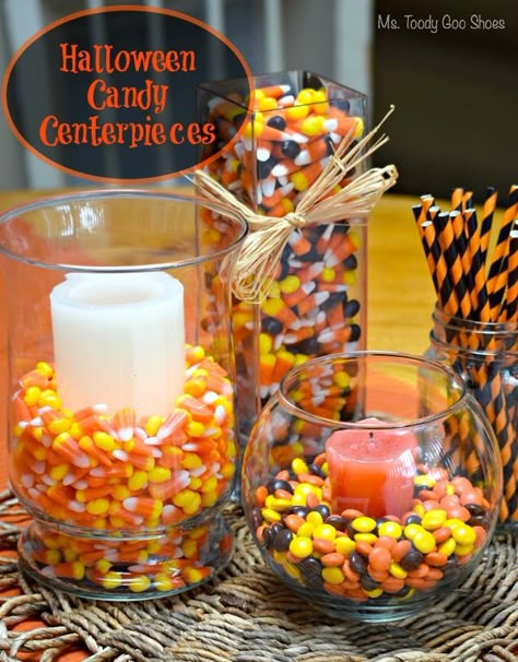 Simple Halloween centerpieces using candy corn and candles #Halloween #CandyCorn #Centerpieces Candy Corn Table Decorations, Halloween Birthday Party Centerpieces, Halloween Candy Centerpiece Ideas, Candy Corn Vase Centerpieces, Diy Standing Halloween Candy Bowl, Candy Corn Vase, Halloween Centerpieces, Simple Halloween Decor, Candy Centerpiece