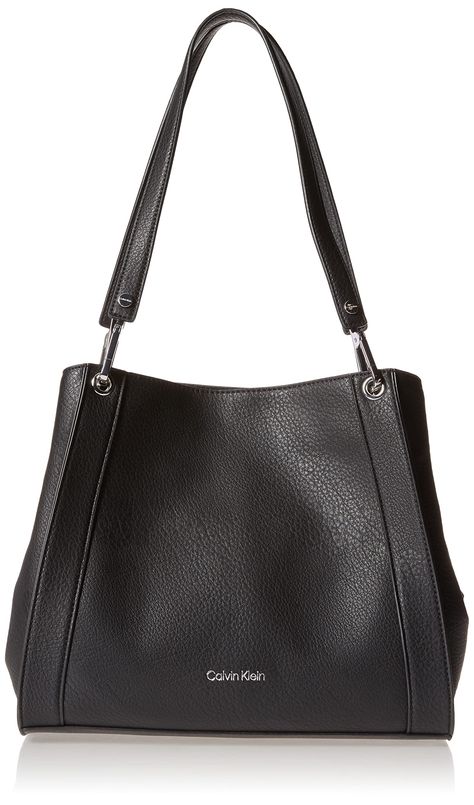 PRICES MAY VARY. Style for every day: This shoulder bag is the perfect size to hold what you need throughout the day; function meets fashion with this roomy tote bag Cruelty-free: A high-quality vegan leather tote bag with pockets from Calvin Klein; luxury designer bags for women with all the fashionable details and none of the guilt Convenient features: Triple compartment organization and and secure the items you need from your tote bag zipper closures make it easy to access Stay organized: 1 e Calvin Klein Tote Bag, Luxury Designer Bags, Bag With Pockets, Tote Bag With Pockets, Trendy Purses, Vegan Leather Tote Bag, Bag Women Fashion, Vegan Leather Tote, Patterned Backpack