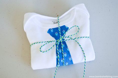 Make a tie onesie tutorial for your little one using this quick and simple tutorial. Such a great baby shower gift idea! Tie Onesie, Make A Tie, Baby Shower Gift Idea, Shower Gifts, Baby Items, Baby Shower Gift, Little One, Baby Shower Gifts, Onesies