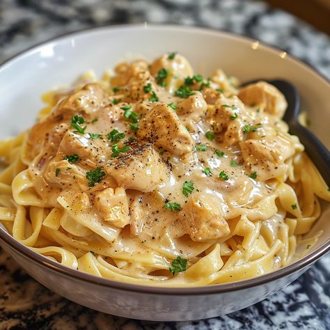 Crockpot Angel Chicken is a quintessential comfort food dish that embodies the simplicity and heartiness of home cooking. This recipe transforms basic ingredients into a luscious meal with minimal effort, ... Read more Angel Chicken Recipe, Angel Chicken, Comforting Dinner, Pasta Varieties, Italian Dressing Mix, Creamy Pasta Dishes, Creamy Chicken Pasta, Italian Dressing, Creamy Chicken