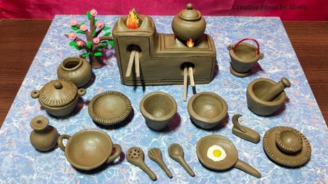 Miniature Clay House | Kitchen Set | DIY Clay Kitchen Set, Clay Kitchen, Saree Function, Cake Tables, Kitchen Sets For Kids, Fairy House Crafts, Clay Fairy, Clay House, Toy Kitchen Set