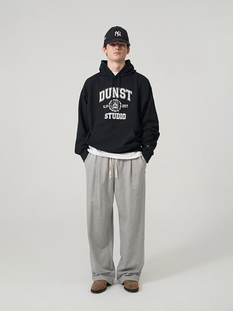 It is a straight fit wide jogger pant with leather D logo embellishment. The sweatpant features relaxed fit silhouette and pleats on the front to make stylish look. The pant can be styled in two ways using the drawstring on the hem. It has leather logo embelishment and embroidery point on the front pocket. The pant is easy to style with different items, especially sweatshirts and hoodies from the brand. - Elastic band waist- Side pockets- Back pockets- Logo label Baggy Grey Sweatpants Outfits Men, Man Sweatpants Outfit, Men’s Sweats Outfit, Sweatpants Fit Men, Guys Joggers Outfits, Sweat Pants Men Outfit, Men’s Sweatpants Fashion, Male Sweatpants Outfit, Sweet Pants Outfits Men