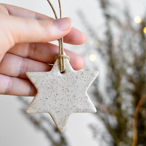 Add a truly special touch to your Christmas with these handmade ceramic Christmas decorations in our gorgeous 'Haven' speckled white satin glaze (the reverse is unglazed and shows the white porcelain clay). Hang them in your Christmas tree or on some beautiful magnolia or pine branches, decorate your gifts for a special touch or use them as table decorations or napkin ties. Hand finished with a gorgeous natural polished linen flax string, each ornament is a labour of love which we hope will beco Ceramics Christmas, Clay Christmas Decorations, Ceramic Christmas Decorations, Pottery Ornaments, White Christmas Ornaments, Christmas Clay, Polymer Clay Christmas, Pottery Gifts, Xmas Tree Decorations