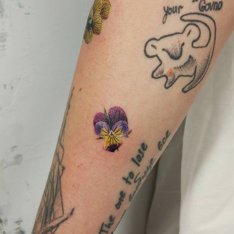 Inna B pansy flower Tattoo Pansy Tattoo Color, Wild Pansy Tattoo, Pansie Tattoo, Pansy Flower Tattoo, Mum Tattoos, Pansy Tattoo, Flower Graduation Cap, Soft Tattoo, Mum Tattoo