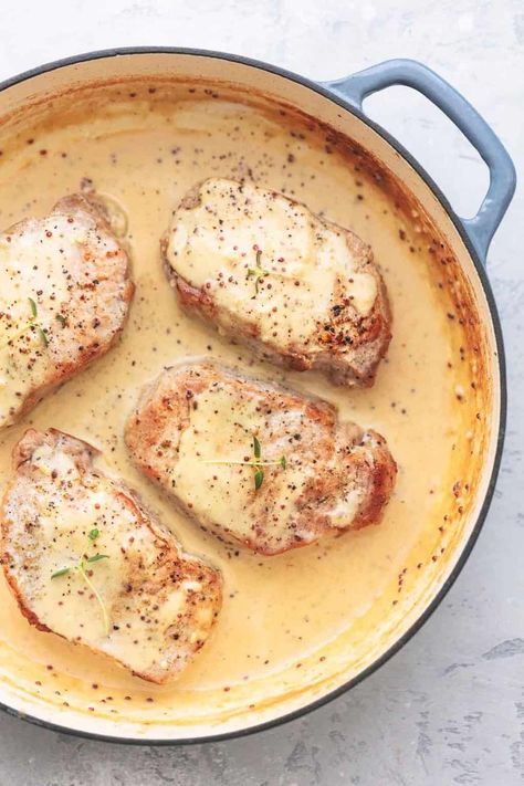 Pork Chops with Dijon Cream Sauce | Creme De La Crumb Creamy Dijon Pork Chops, Dutch Oven Pork Chops, Tender Baked Pork Chops, Dijon Pork Chops, Pork Chop Sauce, Healthy Pork Chops, Healthy Pork Chop Recipes, Dijon Cream Sauce, Creamy Dijon