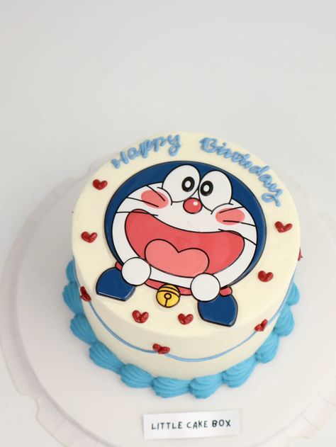 Bring joy to your child's birthday with our Doraemon Happy Cake from Little Cake Box! Featuring the beloved character in a delightful design, this cake is perfect for any celebration. Made with fresh, high-quality ingredients and customizable to fit your party theme, it’s sure to be a hit with kids and adults alike. Order your Doraemon Happy Cake today! Doraemon Theme Cake, Doremon Cake Designs, Doraemon Birthday Theme, Cake Character Design, Doraemon Cake, Simple Birthday Cake Designs, Cake Designs For Kids, Online Cake Delivery, Cake Delivery