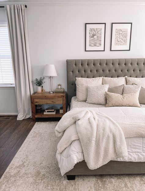 Master Bedding Gray, Dark Grey Bed With Beige Bedding, Grey Bedroom Suite Ideas, Bedroom Idea With Gray Headboard, Bedding Inspiration Grey Headboard, Room Ideas Gray Bed Frames, Room With Grey Bed Frame, Bedroom With Grey Upholstered Headboard, Grey Bed Beige Bedding