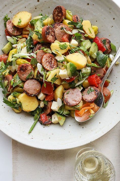 After a quick sear in a skillet, crispy rounds of smoked sausage—like the classic version from Hillshire Farm—quickly transforms an everyday potato salad from a side dish into a satisfying meal.#appetizers #appetizerrecipes #appetizerideas #apps #entertaining Summer Sausage Salad, Salad With Sausage, Hardy Salad Recipes, Chicken Sausage Salad, Sausage Sides, Sausage Salad Healthy, Hardy Salads, Sausage Salad Recipe, Spicy Sausage Pasta