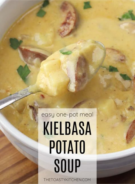 Kielbasa potato soup recipe by The Toasty Kitchen. Kielbasa potato soup is a hearty soup filled with sausage, potatoes, and shredded cheddar cheese. Pair this creamy, comforting soup with some crusty bread or a side salad for a quick and filling weeknight meal. #kielbasa #potatosoup #creamysoup #heartysoup #wintermeals #cheese #sausage #recipe #Homemade Kielbasa Soup With Potatoes, Kielbasa Potato Soup, Cheesy Kielbasa, Chicken Asian, Kielbasa Soup, Soup Potato, Sausage Potato Soup, Bratwurst Recipes, Sausage Soup Recipes