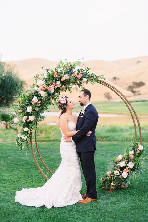 Kristina and Michael added beautiful flowers to a circle arch for their Vineyard Lawn ceremony at Wente Vineyards. Circle arches create a stunning backdrop for any outdoor ceremony. Grace Kathryn Photography. Wooden Wedding Arches, Circle Arch, Wedding Ceremony Ideas, Rustic Boho Wedding, Wedding Ceremony Arch, Outdoor Birthday, Wedding Arch Flowers, Wedding Arbour, Arch Flowers