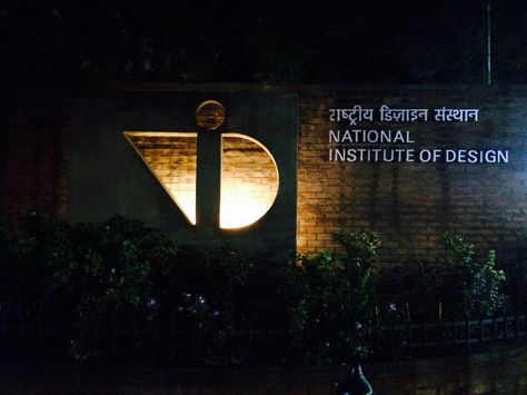 The NID (National Institute of Design) logo is  a font type called Frutiger's logotype, which was designed by the famous typeface designer Adrian Frutiger. Adrian designed the word mark for the National Institute of Design in Ahmedabad, India. The institute renamed its previous name  National Design Institute to National Institute of Design to match Adrian Frutiger's stylized NID logotype. National Institute Of Design Ahmedabad, Nid Ahmedabad, Institute Logo, Adrian Frutiger, National Institute Of Design, Marriage Invitation, Vision 2024, Design Institute, Human Figures