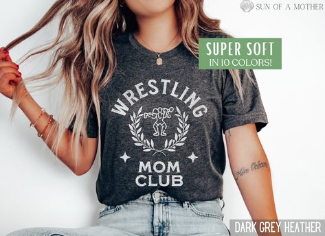 This Wrestling Mom Shirt is the perfect Wrestler T Shirt for your wardrobe! Our Bella and Canvas tees are super soft, DTG printed (printed with ink), and 100% cotton. ❗❗There may be a slight difference in the colors due to different monitors. ❗❗ 🌞 HOW TO ORDER 🌞 * Select your size and color from the drop-down menu * Add your shirt to cart. If you would like more than one, add each one to cart individually. * Proceed to check out! * Your shirt will be ready to ship in 1-3 days! 🌞 SIZING 🌞 Check the Size Chart and Fit Guide in the photos for reference! 🌞 PRODUCTION + SHIPPING 🌞 * Order Production: 1-3 business days  * Standard Shipping: 1-5 business days after production time 🌞 SHIRT DETAILS 🌞 * 100% combed and ring-spun cotton (fiber content may vary for heather colors) * Fabric wei Wrestling Mom Outfit, Wrestling Mom Shirts Ideas, Wrestling Mom Shirts, Wrestling Shirts, Wrestling Mom, Mama Tshirts, Circuit Ideas, Mom Era, Senior Night