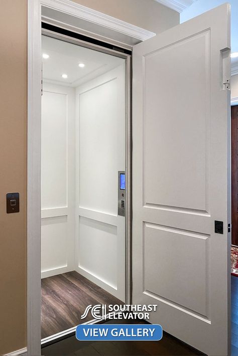 White Shaker style residential elevator with a touchscreen car operating panel and four LED lights Home With Elevator, Indoor Elevator Home, Residential Elevator Design, Home Elevator Ideas, Hidden Elevator In House, Home Lifts Elevator, Residential Elevator Interior Design, In Home Elevator, Lifts Elevator Home