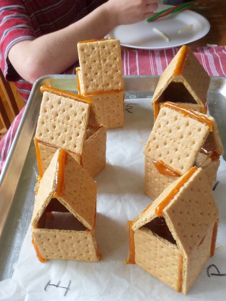 The Easy Trick for Making Graham Cracker Gingerbread Houses to Stick #HealthyKitchenHacks | @TspCurry Graham Cracker Gingerbread Houses, Graham Cracker Gingerbread, Graham Cracker House, Graham Cracker Gingerbread House, Cracker House, Gingerbread House Parties, Smitten Kitchen, Christmas Gingerbread House, Winter Crafts For Kids