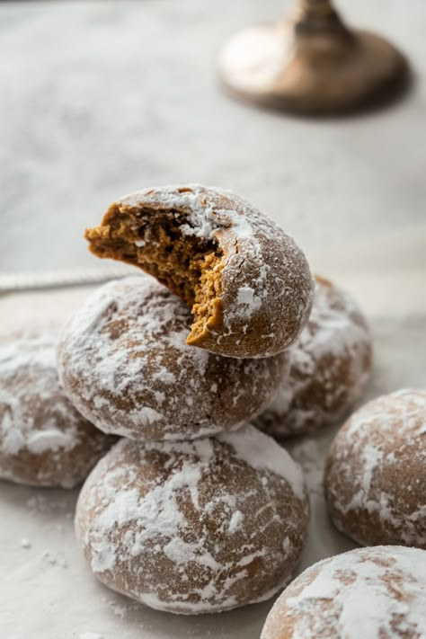 'Tis the season for cookies! Pfeffernüsse is a festive German spice cookie and a holiday classic among gingerbread lovers everywhere. These iced confections are made with molasses, pepper, ginger, and a mix of warm, wintry spices. These chewy cookies are a crowd favorite -- perfect for cookie swaps and holiday parties. Spiced Holiday Cookies, Swiss Anise Cookies, German Pheffernuese Cookies, German Molasses Cookies, German Ginger Cookies, German Spice Cookies Recipe, 1920s Cookies, Austrian Christmas Cookies, German Holiday Cookies